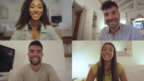 Two millennial happy couple chatting in video call talking and greetings at the start and final. Mixed race diverse smiling young people look at web camera laughing using video conferencing at home
