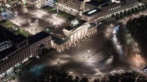 Hyperlapse above Berlin Brandenburg Gate at nights. Aerial view