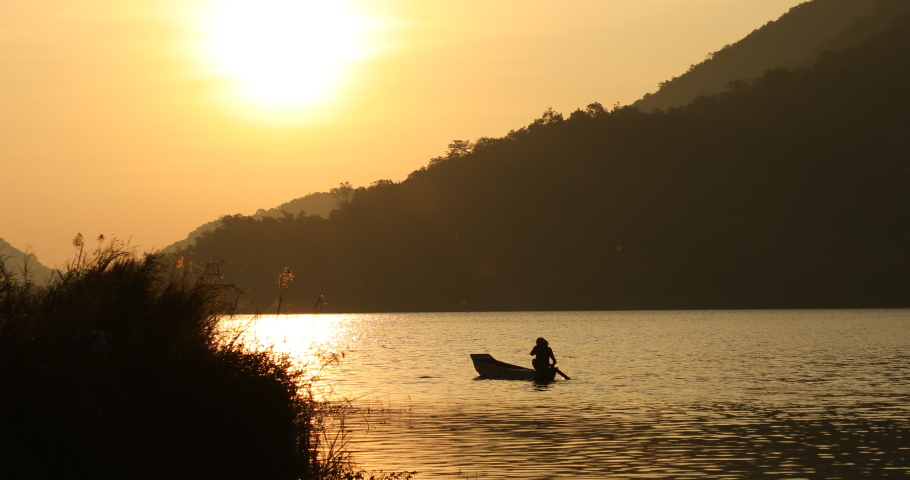 Fisherman Boat in a sunset