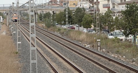 Cunit, Tarragona, Spain, December 2020 A suburban train passing through the town.