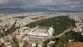 Aerial drone video of under construction stadium near famous Park of Filadelfia, Athens, Attica, Greece
