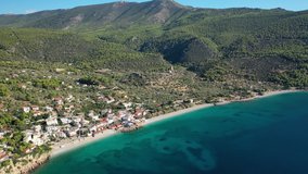 Aerial drone video of beautiful seaside village and turquoise beach of Porto Germeno, Corinthian gulf, West Attica, Greece