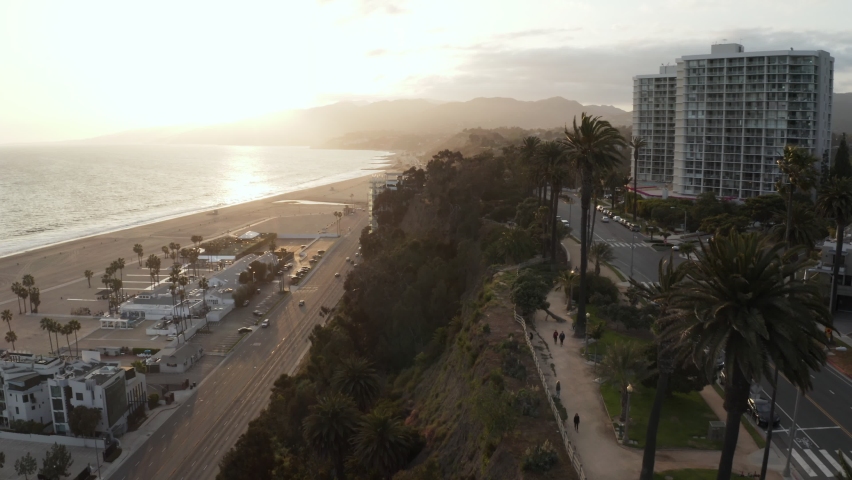 Santa Monica Palm tree Ocean Drive aerial at sunset Royalty-Free Stock Footage #1063951924