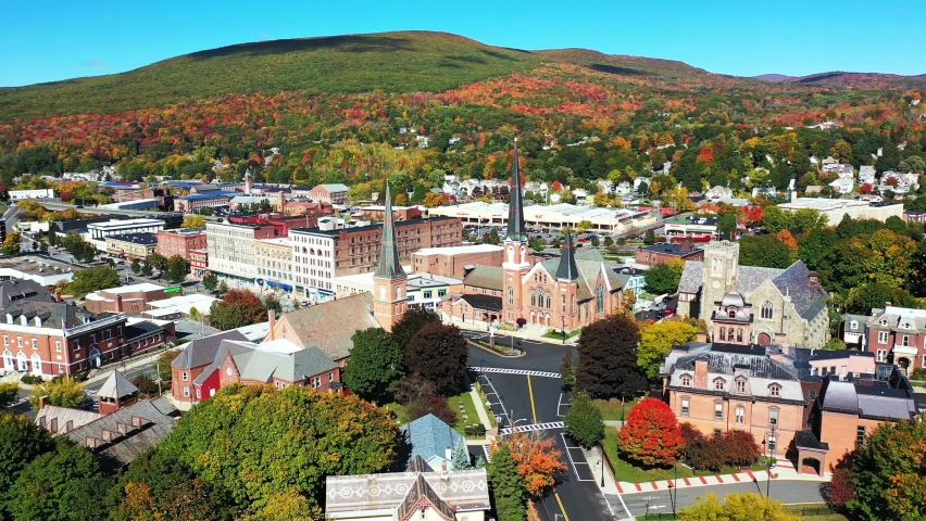 Aerial View of Downtown North Adams, Massachusetts USA. First Baptist Church and Public Library on Sunny Autumn Day, Orbit Drone Shot Royalty-Free Stock Footage #1063956028