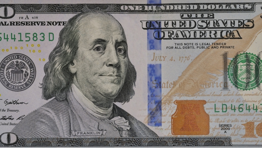 Ben Franklin winks at us from the 100 dollar bill. Funny character animation of the United States money. | Shutterstock HD Video #1063968514