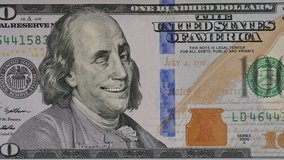 Ben Franklin winks at us from the 100 dollar bill. Funny character animation of the United States money. - Powered by Shutterstock - Get 15% off with code: PIKWIZARD15