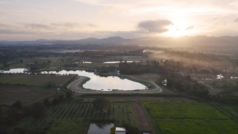 Aerial view of green Mountain hill with lake or river. Nature landscape background in Khao Yai, Nakhon Ratchasima, Thailand.