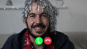 Headshot portrait screen view of a happy man wearing a wig sitting at home and having a webcam call online on laptop. Happy caucasian mid adult man talking on video call, social distancing concept