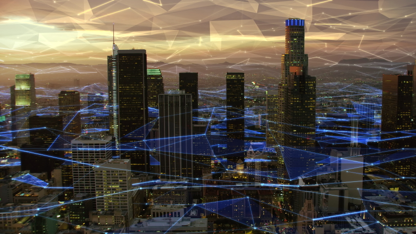 Connected aerial view of the Financial District in Downtown Los Angeles at sunset. Famous skyscrapers with futuristic network. California, United States. Royalty-Free Stock Footage #1064002765