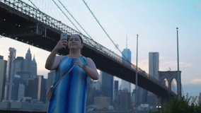 Girl Takes A Selfie on New York City Brooklyn in 4K Slow motion 60fps
