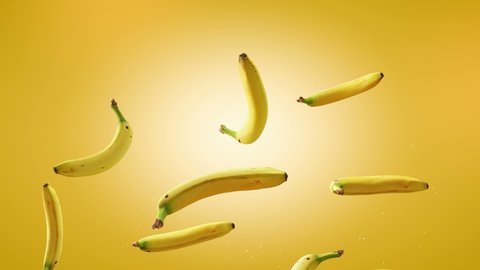Flying of Bananas in Yellow Background. Speed up and falling down bananas. Two different speed and green screen. Professional slow motion 4K 3d animation.