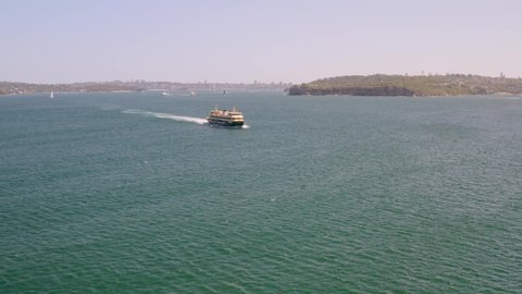 Aerial drone shot of  flyby past the famous Manly Ferry in Sydney, Australia.