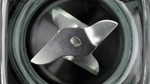 Sharp blender rotating blades. Close-up shot.