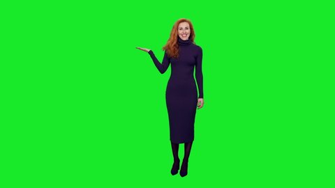 Charming elegant woman with beautiful smile doing presentation and gesturing on green screen background, chroma key 4k pre-keyed footage