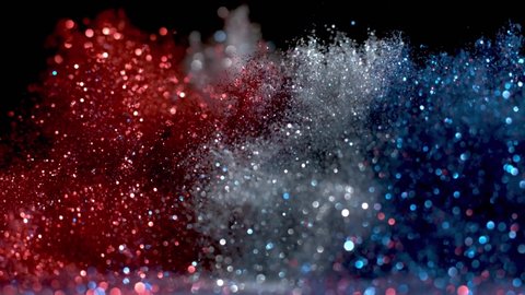 Beautiful red - blue - white silver shimmering particles France  flag colors in slow motion.  Animation of Dynamic Wind Particles In The Air With Bokeh.
