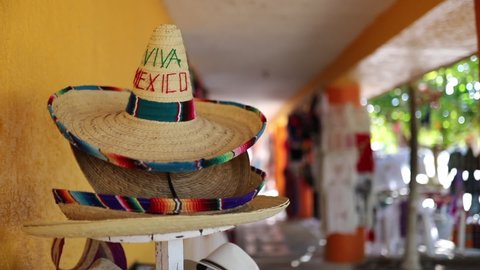 Video Circling around of a colorful sombrero with words Viva Mexico in a shop in Mexico