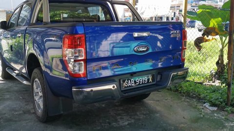 Sabah,Malaysia-December 13 2020 : Selective focus picture with noise effect of double cab pickup truck by Ford Ranger.