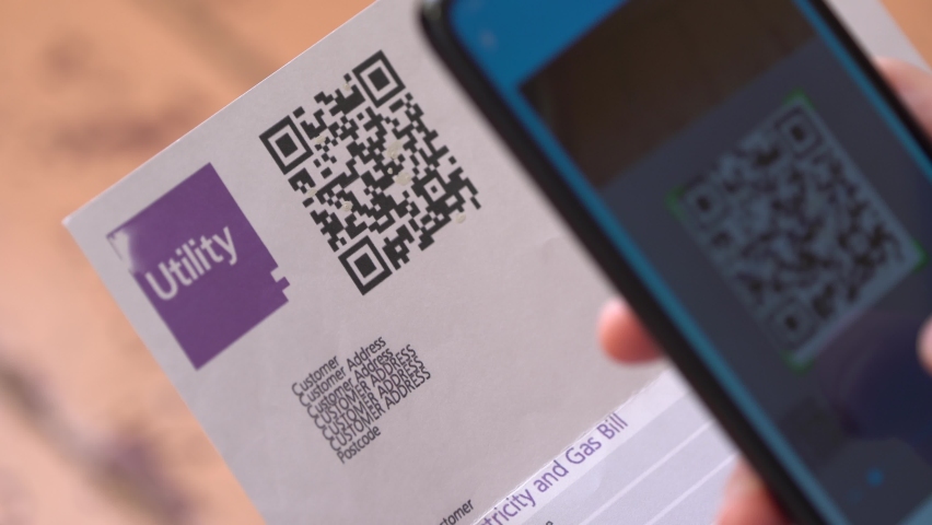 The utility bill. Contactless payments during of social distancing period. QR code scanning app on smartphone. Touchless digital payment option for businesses | Shutterstock HD Video #1064081566