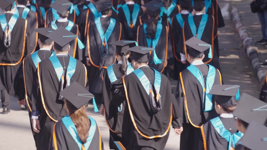 A group of graduates with a bachelor's degree attended the certificate presentation ceremony at the university | Shutterstock HD Video #1064085673