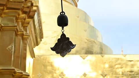 The Bell blown in the wind  in Chiangmai temple, Thailand.