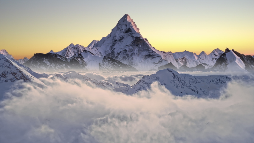 The Himalayas Everest Beautiful Mountain Range Winter Inspiring Landscape Snow Cold Sea Of Clouds Aerial Flight Footage Over Peaks Epic Panorama Nature Success Summit Top Peak 4K | Shutterstock HD Video #1064110957
