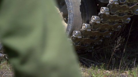Military tank caterpillar in motion slow motion