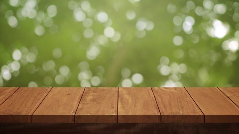 Wood Table and Chair, Wood table bar and nature tree bokeh blurred background at morning time and beautiful nature sun light, Top wood table space area for products shows. 4K UHD. Video Clip.