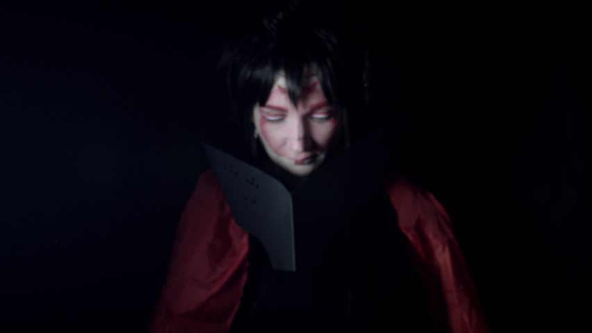4k Black Background of Geisha Woman Posing with Black Eyes