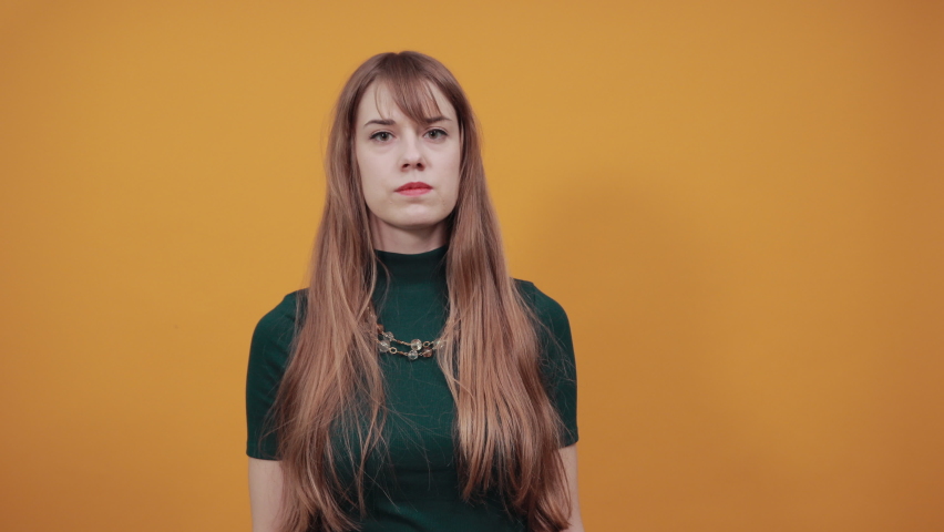Side view of standing young beautiful watching. Rear view people collection. Backside person. Profile sideways, isolated over background. Stock photo a well dressed.