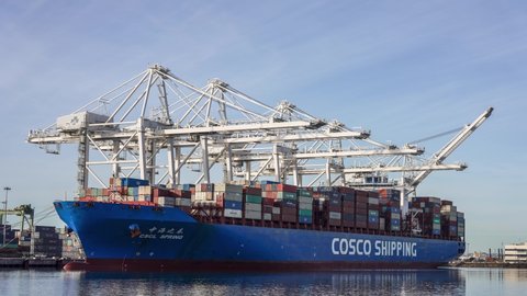 Long Beach, CA - December 14 2020: Cosco Spring container ship being loaded in Port of Long Beach