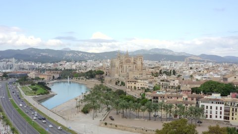 Beautiful Establishing Shot of Palma de Mallorca City with Cathedral in Summer and Blue Sky Daylight, Aerial Dolly in