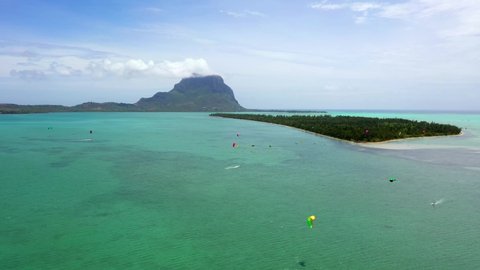 Aerial view: kitesurfing on Benitiers island in Mauritius