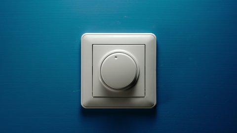 Dimmer button turning on a blue wall - Stop Motion