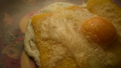 Fried egg with polenta and parmesan.