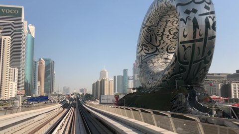 Dubai, United Arab Emirates, December 2020-Riding Dubai metro in the Downtown Financial District next to the Museum of the Future