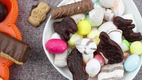 Top view  set of colorful assorted sweets and candies on textile background.