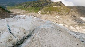 Aerial view by drone fpv of glacier des Bossons, Chamonix, France