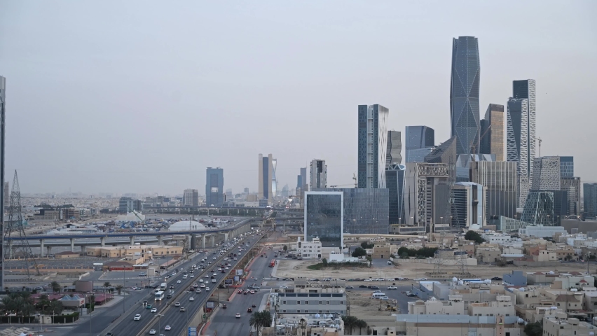 Riyadh City and King Abdullah Financial District time-lapse sunset aerial view. Main road King Fahd Road appears. twilight and sunset time. Royalty-Free Stock Footage #1064230243