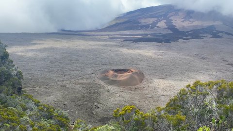 Piton de la Fournaise, Reunion - October 2020 : View of the Formica Leo, a small volcanic crater of the volcano Piton de la Fournaise on Reunion Island, on a cloudy day