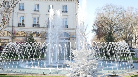 Tours, France. view of fountain in front of Town hall of the city of Tours, (Mairie de la ville de Tours) with christmas decoration. Mairie de Tours