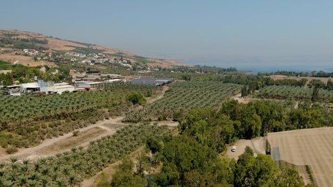 Aerial shot of the Sea Of Galilee down to the Jordan River in Israel.