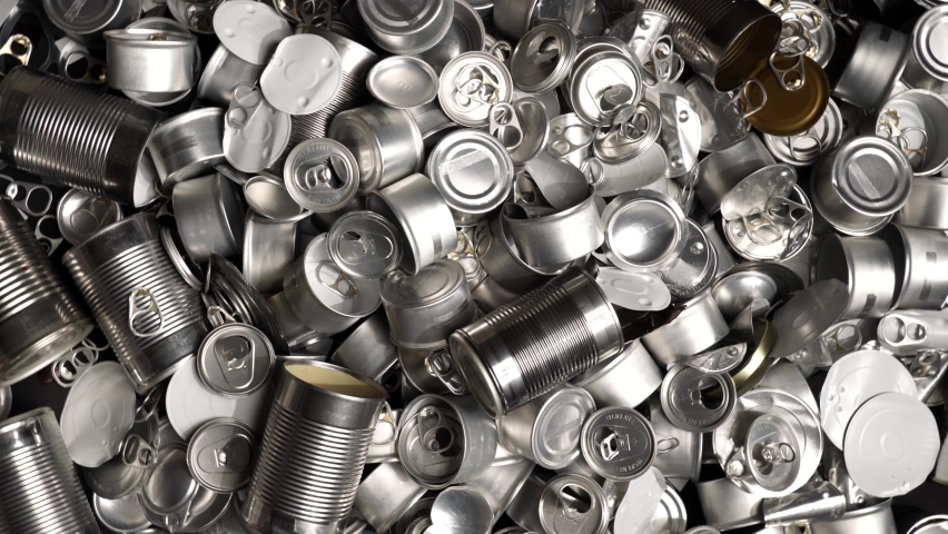 Recycle empty cans and tin for food and drink. Aluminum soda cans and food jars. Sorted metal trash and garbage ready for recycling. Steel rubbish. Zero waste and no pollution. | Shutterstock HD Video #1064278204