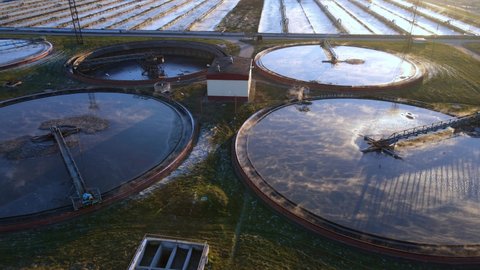 Aerial panoramic view of Water treatment facilities. Sewage treatment plant. Round sedimentation tanks. Radial primary sump. Sedimentation tanks of treatment facilities