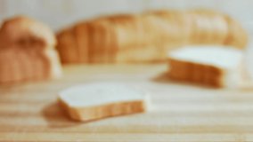 Brown bread cut in slices. Bread slicing