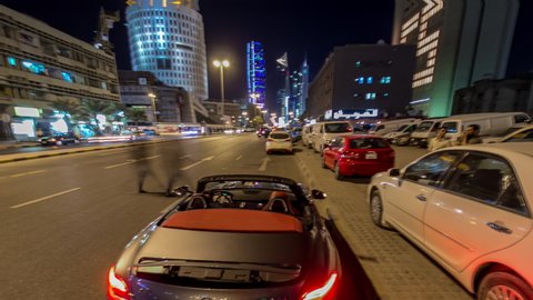 Drive through the traffic in the city highway timelapse hyperlapse drivelapse on convertible in Kuwait. Kuwait, Middle East
