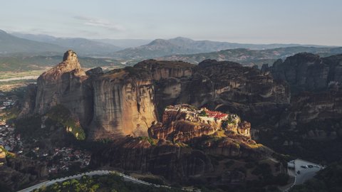 Aerial View of Meteora, Complex of Eastern Orthodox Monasteries, Greece, Holy Trinity Monastery in holy light