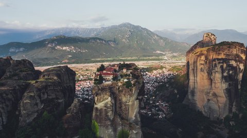 Aerial View of Meteora, Complex of Eastern Orthodox Monasteries, Greece, cyrcling around Holy Trinity Monastery