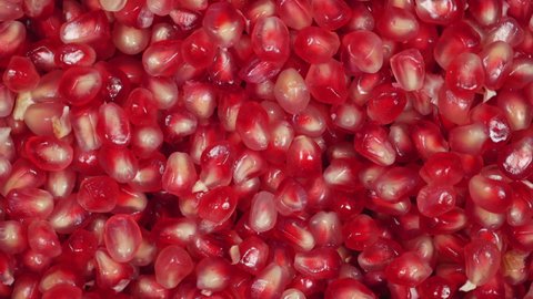Top View Rotating Of Pomegranate Seeds Close Up.
