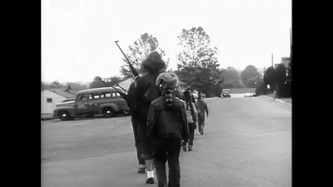 CIRCA 1950s - Children belonging to the Davy Crockett Junior Rifle Club receive instructions and honorary recognition from the NRA at Fort Myer.