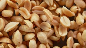 Super Slow Motion Detail Shot of Rotating Peanuts at 1000 fps. - Powered by Shutterstock - Get 15% off with code: PIKWIZARD15